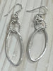 Assorted silver earrings